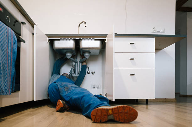 Professional Plumbing technician working in Hampton, CT